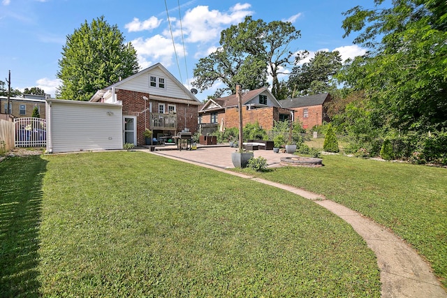 443 W Water St, Kankakee, IL 60901 - back of property with a patio and brick siding