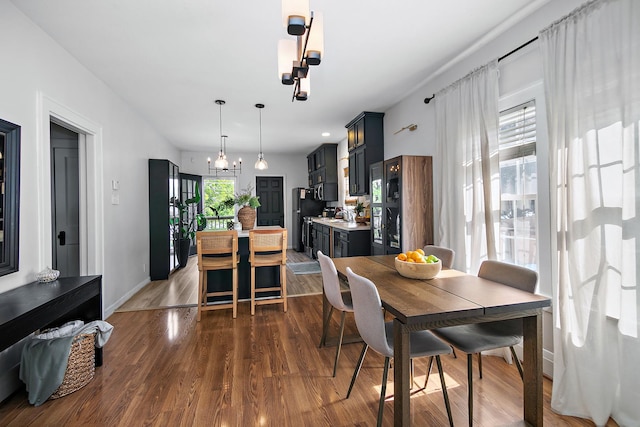 443 W Water St, Kankakee, IL 60901 - dining room with wood finished floors and a chandelier