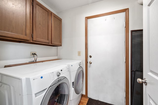 3050 Ashton Ct, Westchester, IL 60154 - laundry area with cabinet space, independent washer and dryer, and light wood finished floors