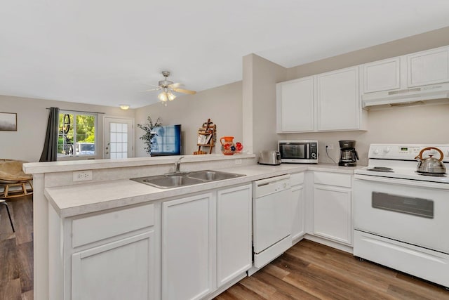 1303 Silverstone Dr Unit 1303, Carpentersville, IL 60110 - kitchen with white appliances, under cabinet range hood, a peninsula, light countertops, and white cabinetry
