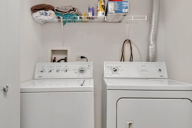 1303 Silverstone Dr Unit 1303, Carpentersville, IL 60110 - laundry area with washer and clothes dryer