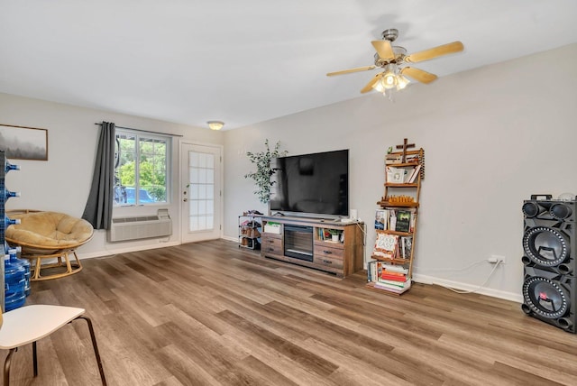 1303 Silverstone Dr Unit 1303, Carpentersville, IL 60110 - living room with wood finished floors and a ceiling fan