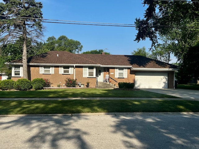 8544 Lawler Ave, Burbank, IL 60459 - single story home featuring brick siding, an attached garage, a front yard, and concrete driveway