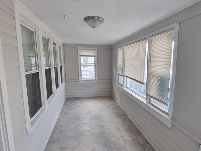 view of unfurnished sunroom