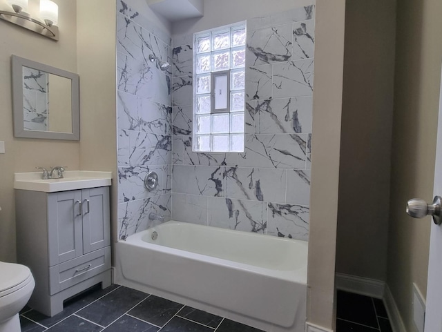 bathroom with vanity, shower / bathtub combination, and tile patterned floors