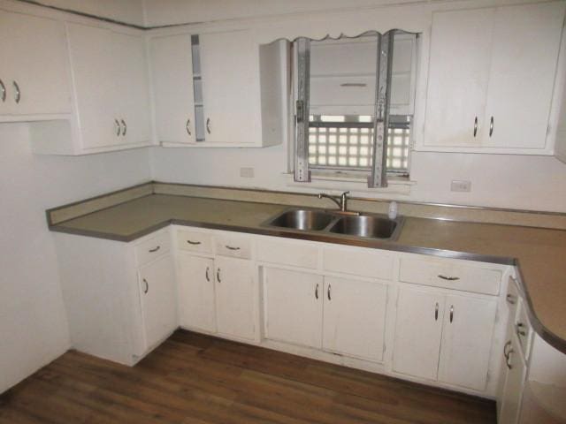 7700 S Ada St, Chicago, IL 60620 - kitchen featuring dark wood-style flooring, white cabinetry, and dark countertops