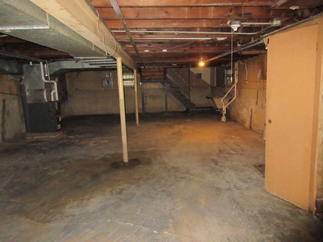 7700 S Ada St, Chicago, IL 60620 - unfinished below grade area with heating unit and stairs