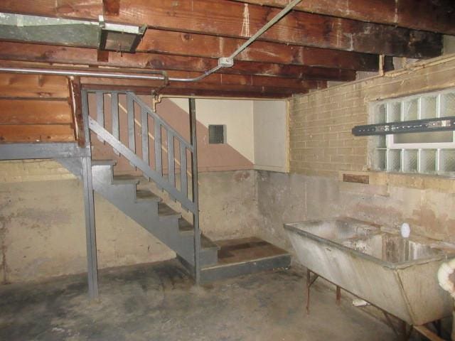 7700 S Ada St, Chicago, IL 60620 - unfinished below grade area featuring stairway and a sink