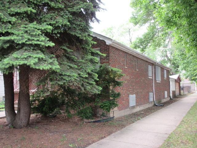 7700 S Ada St, Chicago, IL 60620 - view of property exterior featuring brick siding