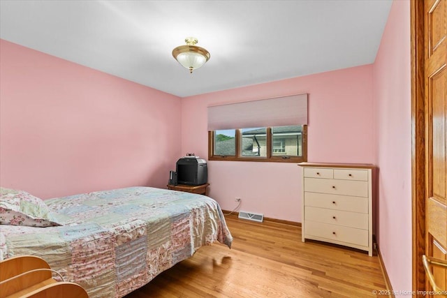 4616 W 105th Pl, Oak Lawn, IL 60453 - bedroom featuring light wood-style flooring and baseboards