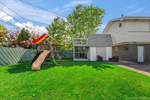 4616 W 105th Pl, Oak Lawn, IL 60453 - view of yard featuring a playground and a storage unit