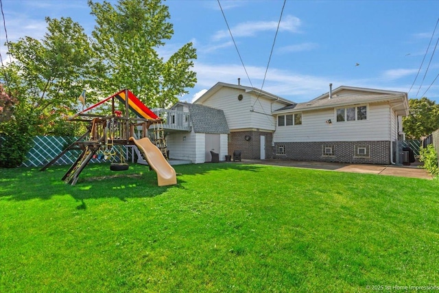 4616 W 105th Pl, Oak Lawn, IL 60453 - back of property with brick siding and a playground