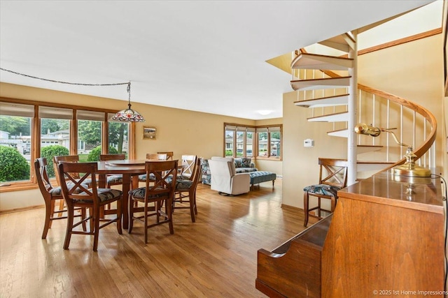 4616 W 105th Pl, Oak Lawn, IL 60453 - dining space featuring wood finished floors and stairs