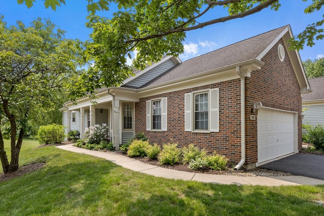 235 Parktrail Ct, Schaumburg, IL 60173 - view of front of property with brick siding, driveway, a front yard, a garage, and roof with shingles