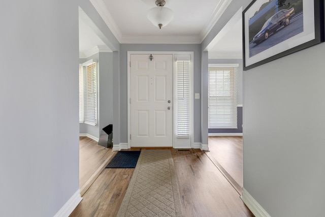 235 Parktrail Ct, Schaumburg, IL 60173 - foyer entrance featuring wood finished floors and crown molding