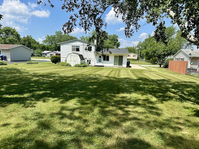 36429 N Edgewood Dr, Gurnee, IL 60031 - back of house with a storage unit