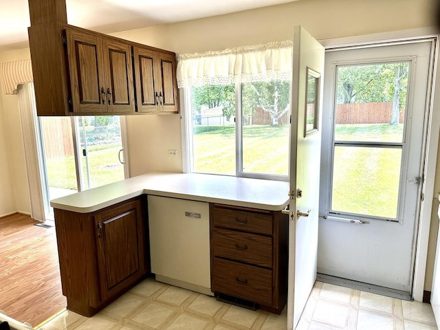 36429 N Edgewood Dr, Gurnee, IL 60031 - kitchen featuring light countertops, light floors, and a peninsula