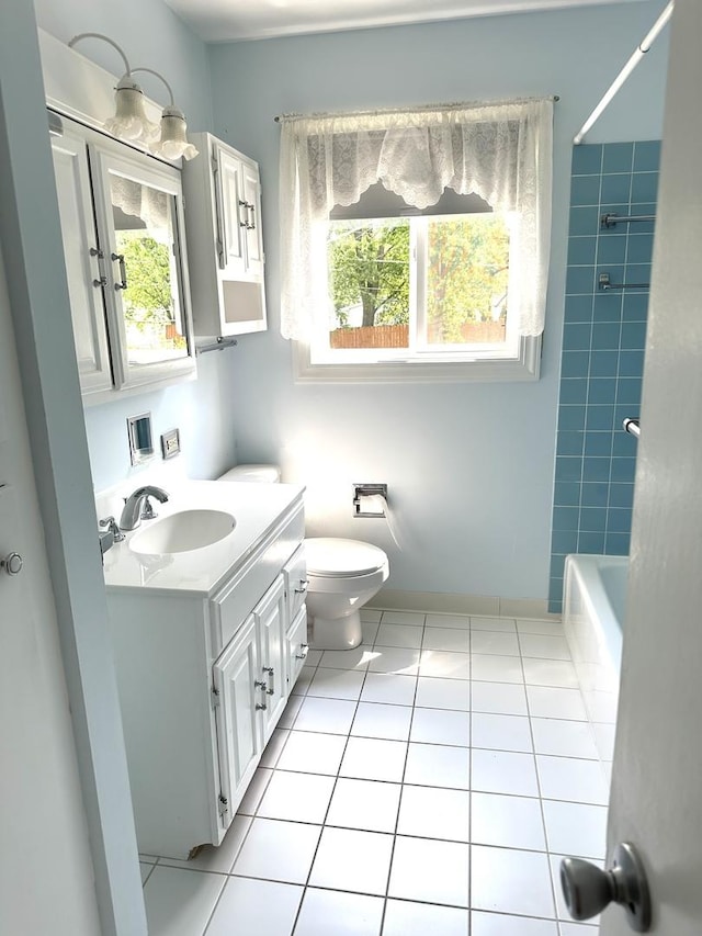 36429 N Edgewood Dr, Gurnee, IL 60031 - bathroom with healthy amount of natural light, vanity, shower / washtub combination, and tile patterned floors