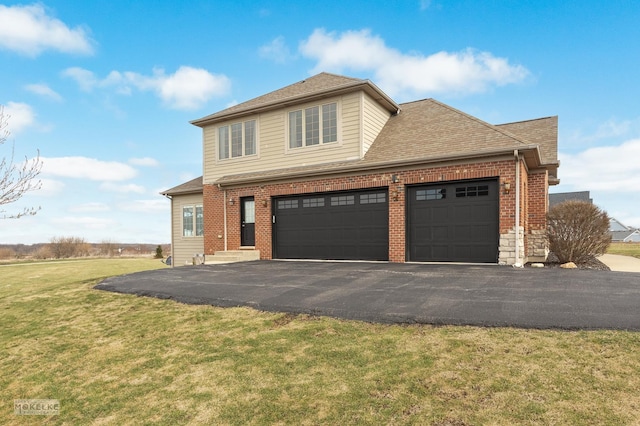 9299 Lee Hill Rd, Newark, IL 60541 - view of front of home with driveway, a garage, a front lawn, roof with shingles, and brick siding