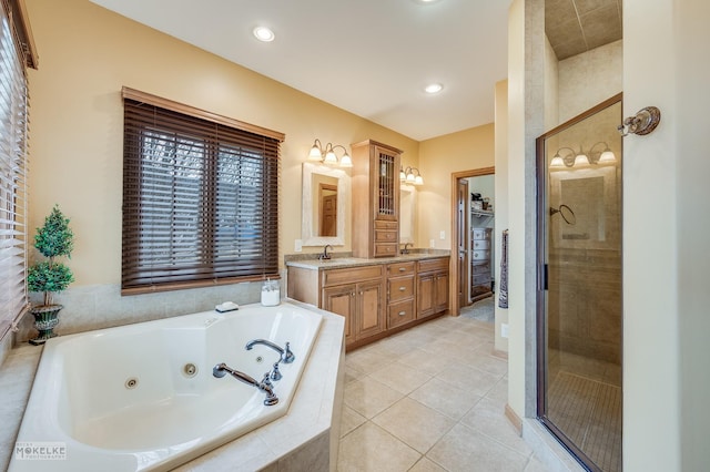 9299 Lee Hill Rd, Newark, IL 60541 - bathroom with double vanity, a whirlpool tub, a stall shower, tile patterned floors, and recessed lighting