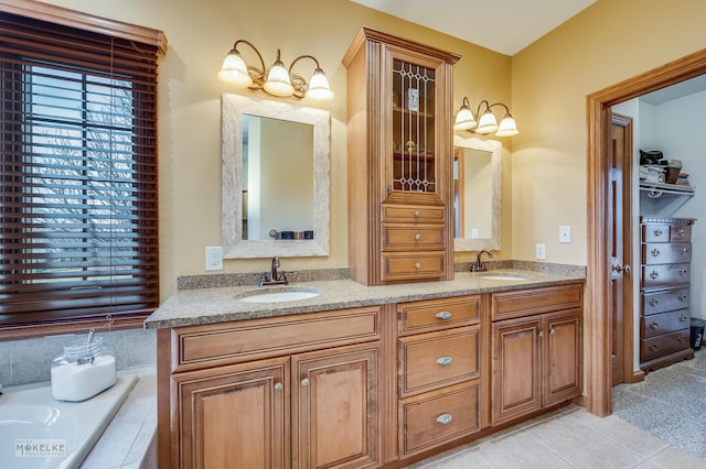 9299 Lee Hill Rd, Newark, IL 60541 - bathroom with double vanity, tile patterned flooring, and a relaxing tiled tub