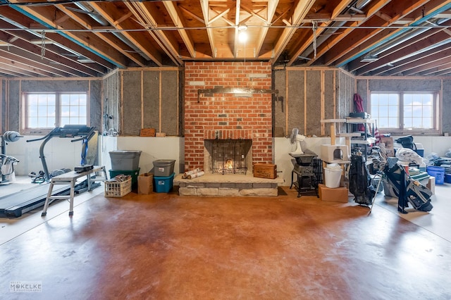 9299 Lee Hill Rd, Newark, IL 60541 - below grade area featuring a brick fireplace
