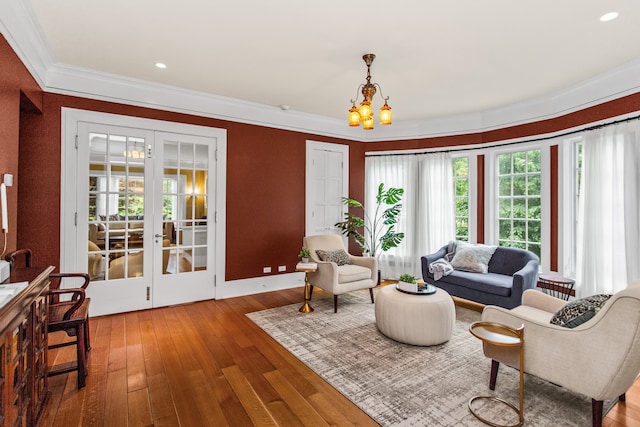 2423 Harrison St, Evanston, IL 60201 - living room featuring a chandelier, hardwood / wood-style flooring, crown molding, and recessed lighting