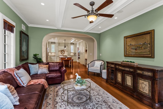 2423 Harrison St, Evanston, IL 60201 - living room with arched walkways, ceiling fan, dark wood-style floors, beamed ceiling, and recessed lighting