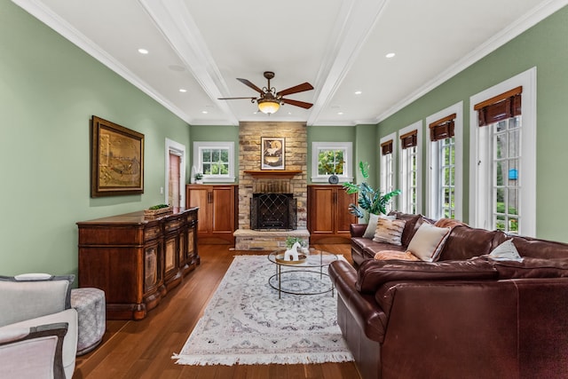 2423 Harrison St, Evanston, IL 60201 - living room with wood finished floors, ceiling fan, a fireplace, ornamental molding, and recessed lighting