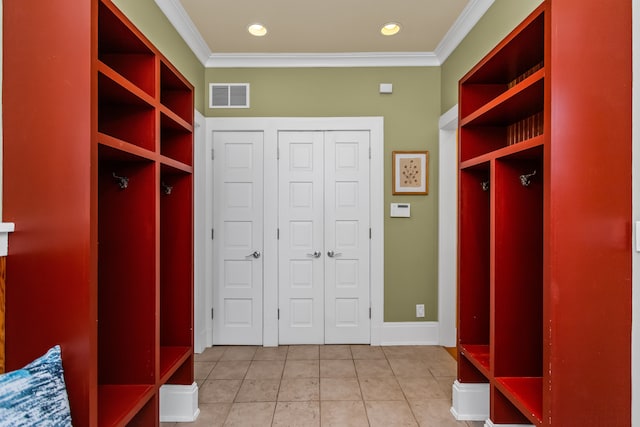 2423 Harrison St, Evanston, IL 60201 - mudroom with ornamental molding, light tile patterned floors, and recessed lighting
