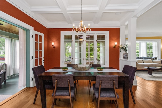 2423 Harrison St, Evanston, IL 60201 - dining room featuring a chandelier, coffered ceiling, healthy amount of natural light, hardwood / wood-style floors, and beamed ceiling