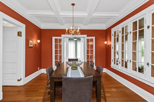 2423 Harrison St, Evanston, IL 60201 - dining room with a chandelier, dark wood-type flooring, coffered ceiling, beam ceiling, and crown molding