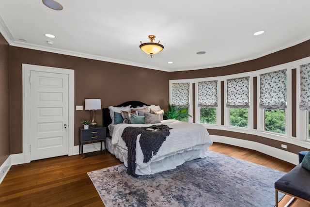 2423 Harrison St, Evanston, IL 60201 - bedroom featuring wood finished floors, ornamental molding, and recessed lighting