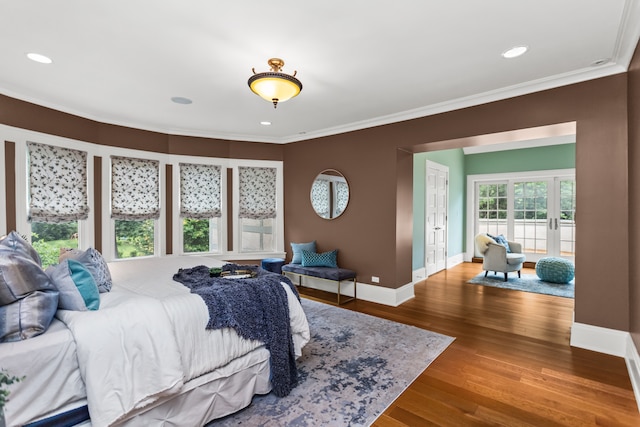 2423 Harrison St, Evanston, IL 60201 - bedroom featuring crown molding, wood finished floors, and recessed lighting