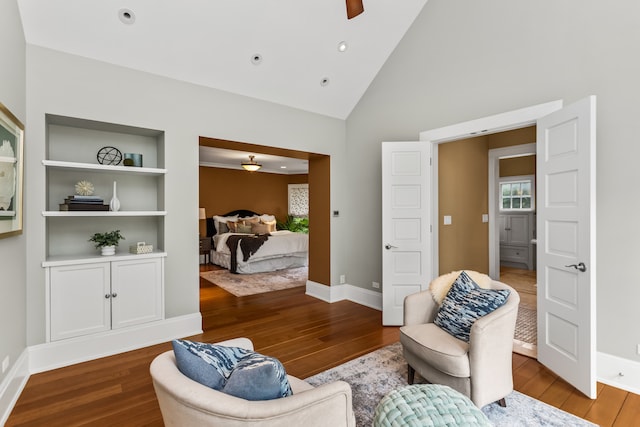 2423 Harrison St, Evanston, IL 60201 - sitting room featuring wood finished floors, plenty of natural light, a ceiling fan, high vaulted ceiling, and recessed lighting