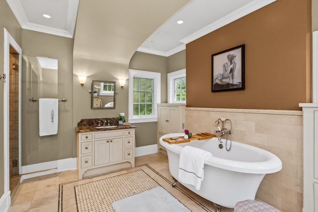 2423 Harrison St, Evanston, IL 60201 - bathroom with vanity, crown molding, a soaking tub, a shower stall, and recessed lighting
