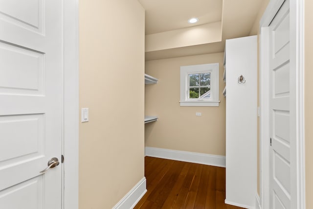 2423 Harrison St, Evanston, IL 60201 - walk in closet featuring dark wood-type flooring