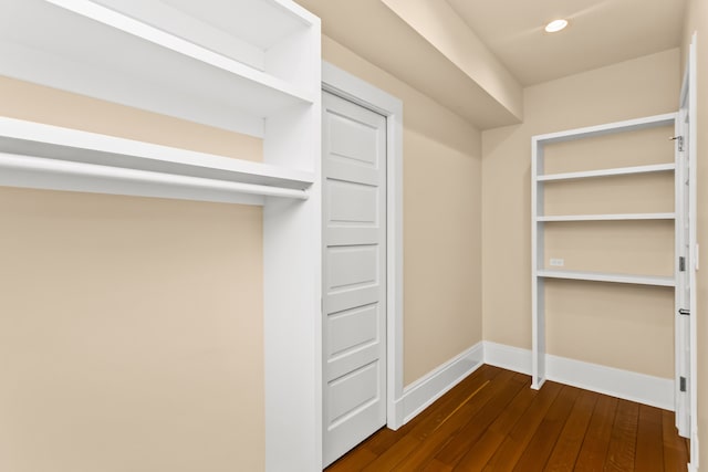 2423 Harrison St, Evanston, IL 60201 - walk in closet with dark wood-style floors