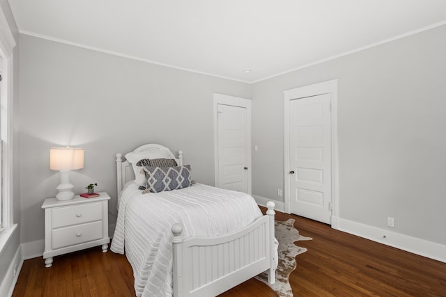 2423 Harrison St, Evanston, IL 60201 - bedroom featuring crown molding and wood finished floors