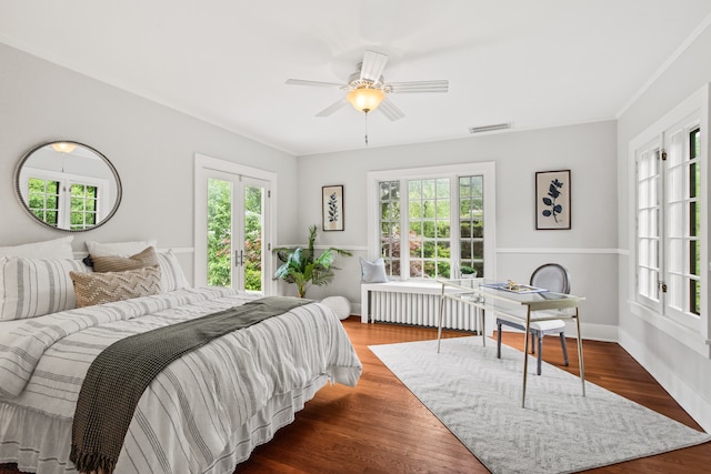 2423 Harrison St, Evanston, IL 60201 - bedroom with a desk, wood finished floors, ceiling fan, and crown molding