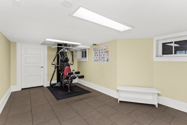 2423 Harrison St, Evanston, IL 60201 - workout area with tile patterned flooring and baseboards