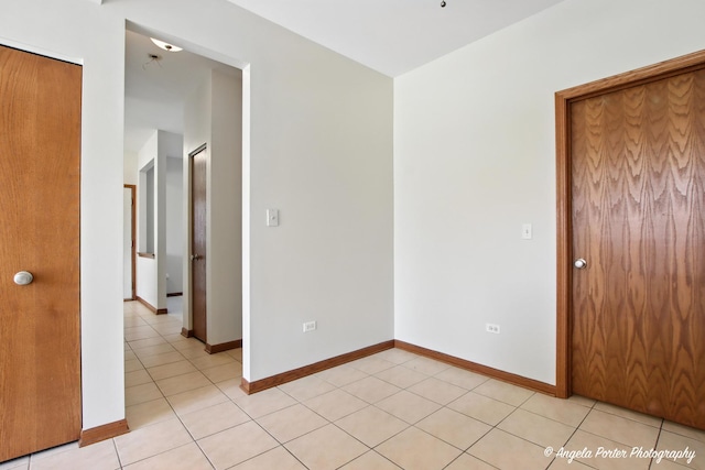 509 Legend Ln, Mchenry, IL 60050 - empty room with light tile patterned flooring and baseboards
