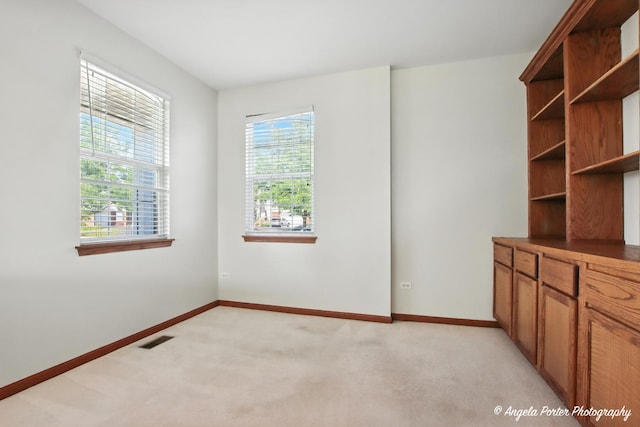 509 Legend Ln, Mchenry, IL 60050 - empty room with light colored carpet and baseboards