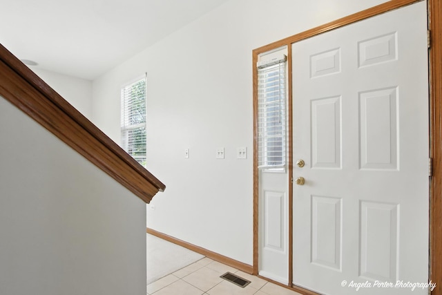 509 Legend Ln, Mchenry, IL 60050 - entryway with light tile patterned floors and baseboards