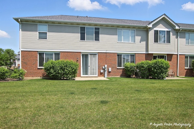 509 Legend Ln, Mchenry, IL 60050 - back of house featuring brick siding and a yard