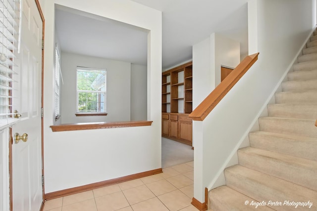 509 Legend Ln, Mchenry, IL 60050 - staircase with baseboards and tile patterned floors
