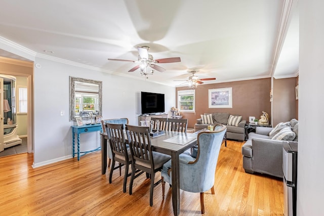 4941 W 119th St, Alsip, IL 60803 - dining area with healthy amount of natural light, light wood finished floors, ceiling fan, and ornamental molding