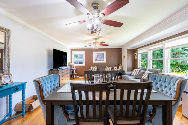 4941 W 119th St, Alsip, IL 60803 - dining area featuring crown molding, light wood-style floors, and ceiling fan