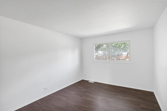 4018 Oxford Ct, Streamwood, IL 60107 - empty room with dark wood finished floors