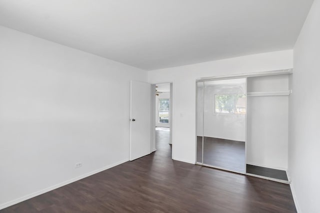 4018 Oxford Ct, Streamwood, IL 60107 - unfurnished bedroom with wood finished floors and a closet